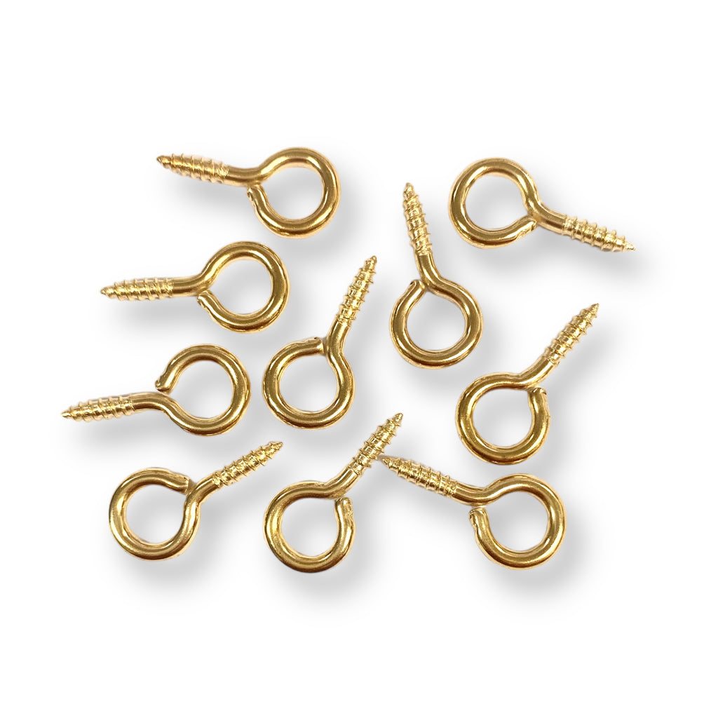 Brass plated, screw in eye loop / hook.  Suitable for various applications such as the installation of picture wire for hanging frames, to attaching ropes for light weight purposes.  Available in 10 piece or 100 piece packs.