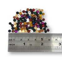 Sold in packs of 100 pieces, and available in a multi coloured or single colour packs.  Craftworkz 4mm wooden beads have a hole size of approximately 1mm. Some slight variation in size is normal.