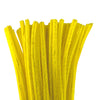 A bundle of yellow chenille stems on a white background