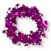 A wired star garland made up of fuchsia colored star-shaped elements coiled into a circle on a white background.