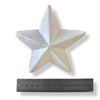A white 3D deco foam five-pointed star ornament shown above a metal ruler for scale on a white background.