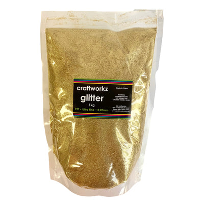 A 1 kilogram bag of Craftworkz ultra fine, gold coloured glitter.