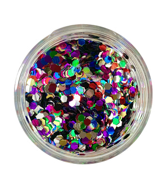 A clear container filled with multicolored hexagonal chunky glitter.