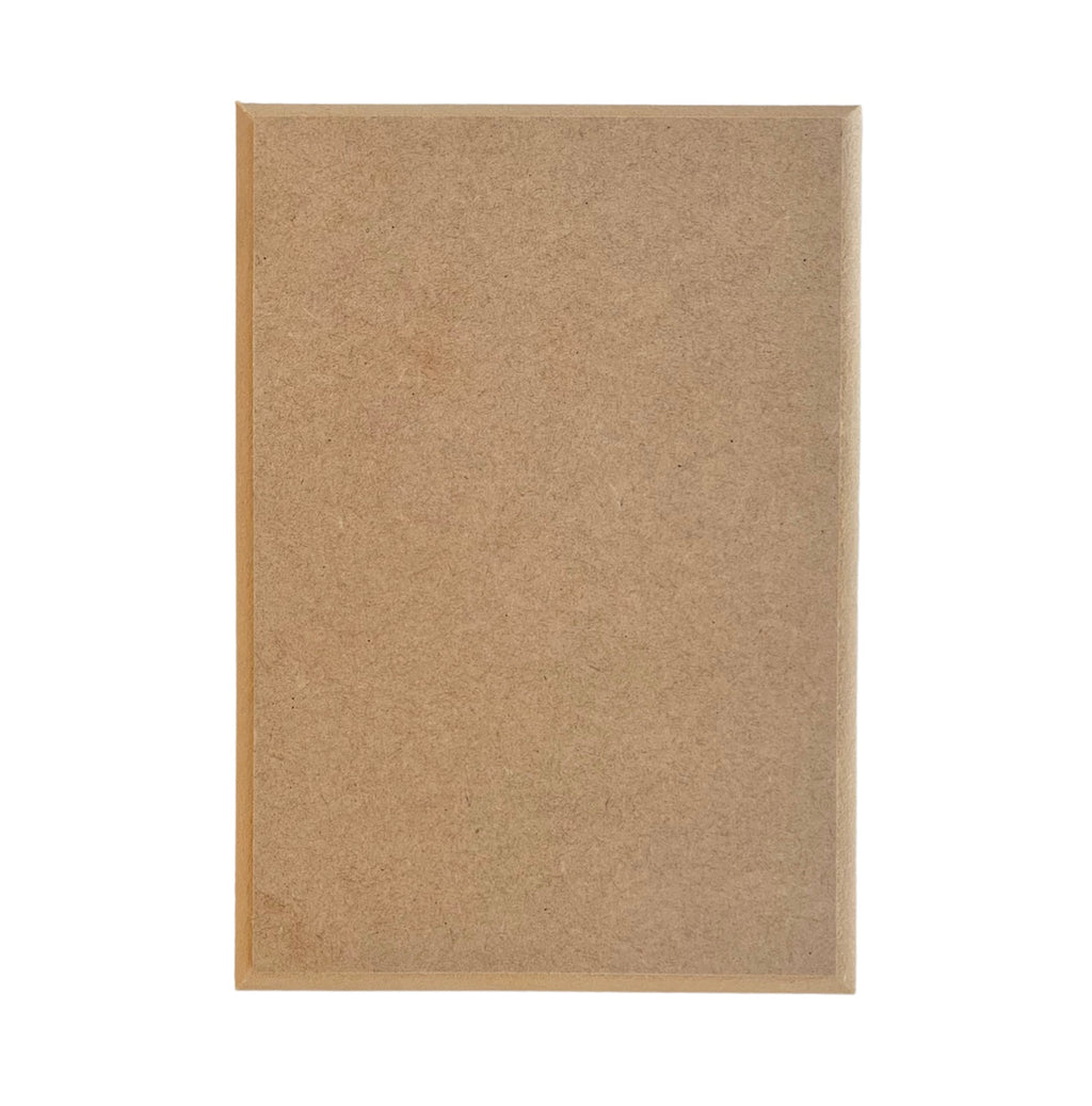 A plain rectangle-shaped MDF craftwood plaque with routered edges, ready to be decorated.