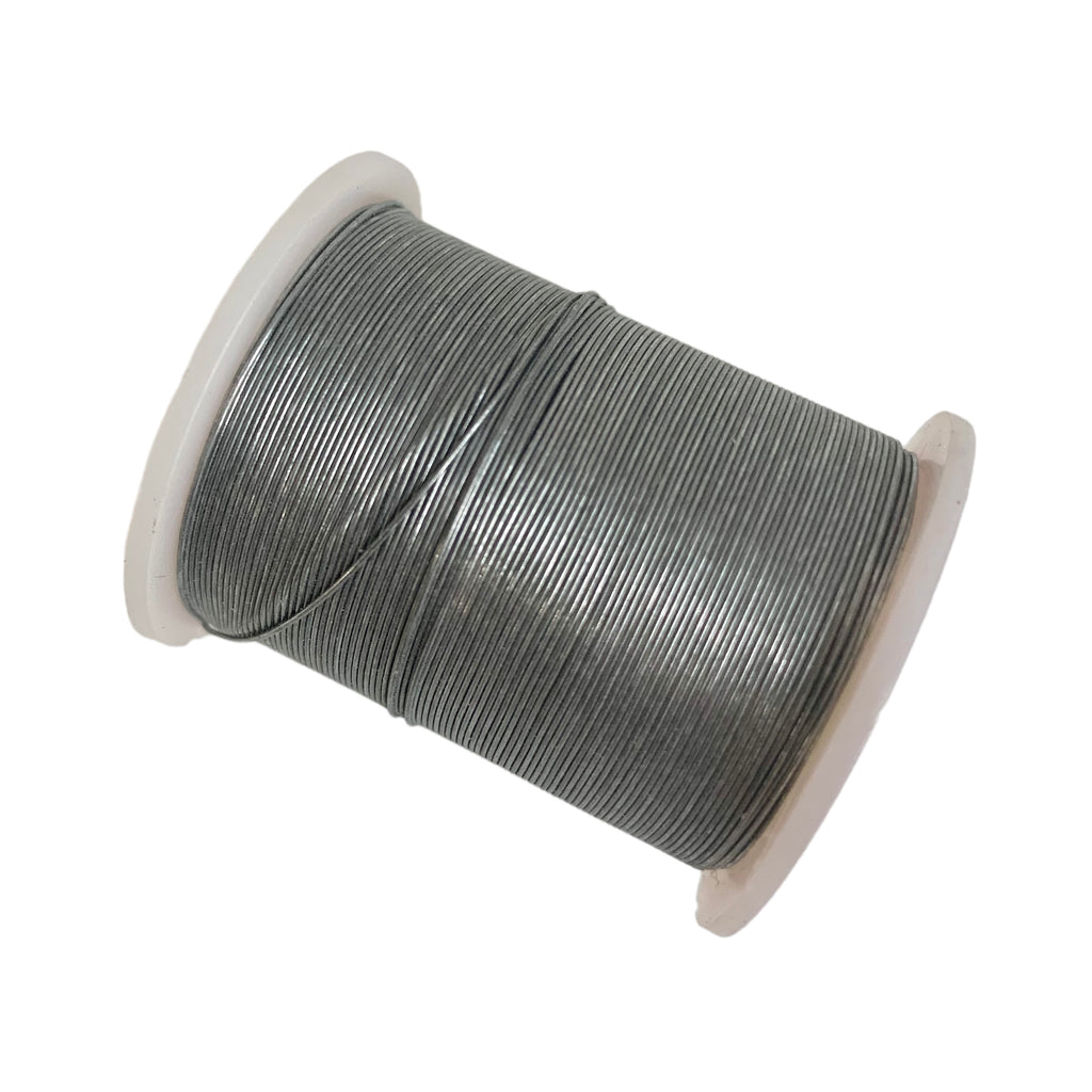 A spool of silver beading wire by Craftworkz. Available in 28 gauge and 32 gauge.