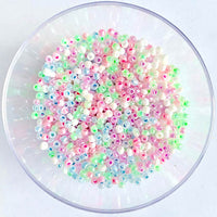 Craftworkz size 10/0 approx. 2mm glass seed beads in pearl multi. Available in over 30 colours.