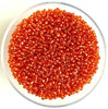 Craftworkz size 10/0 approx. 2mm glass seed beads in transparent orange. Available in over 30 colours.