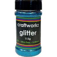 A jar of Craftworkz ultra fine glitter in aqua color, with a label indicating 113g weight and 0.2mm flake size.